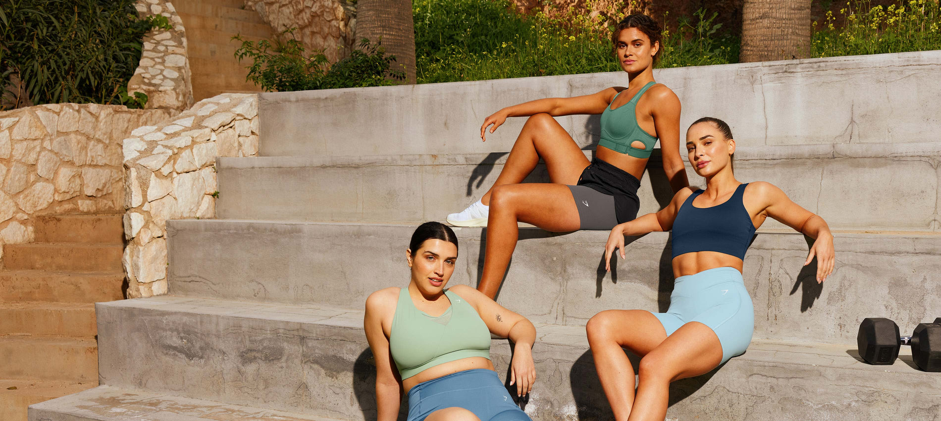 Womens posed in a group in the new key items collection. 